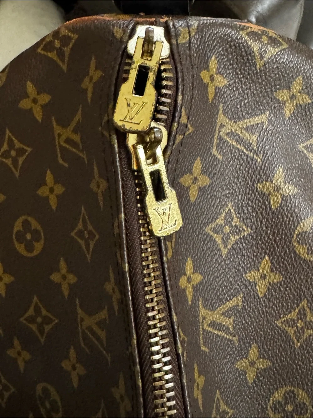Louis Vuitton Brown Monogram Duffel Bag with Black Braided Handles